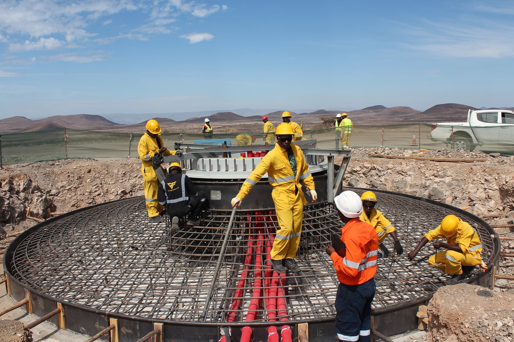 Men building the foundation of a wind turbine