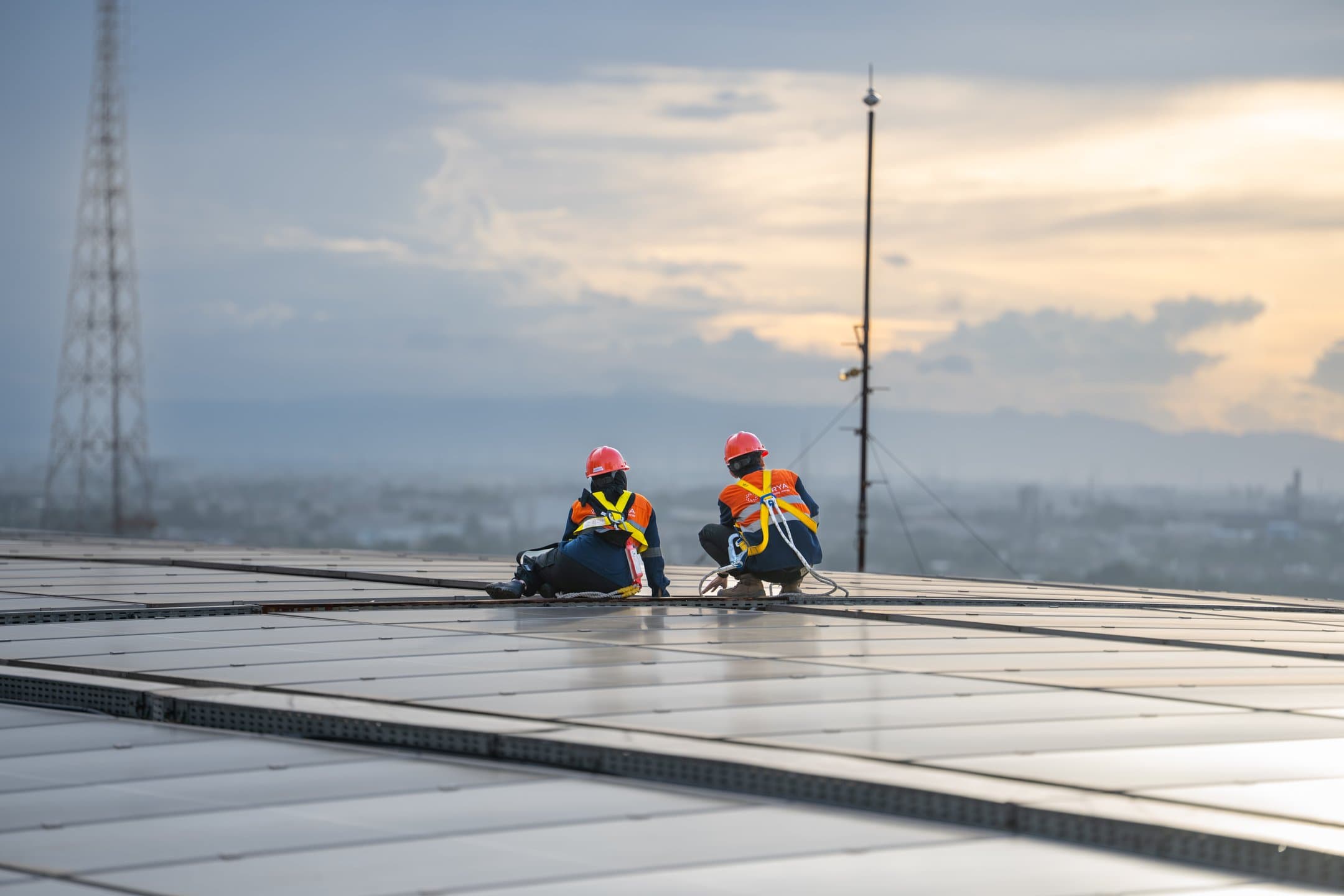 Woman carrying a backpack with a solar cell