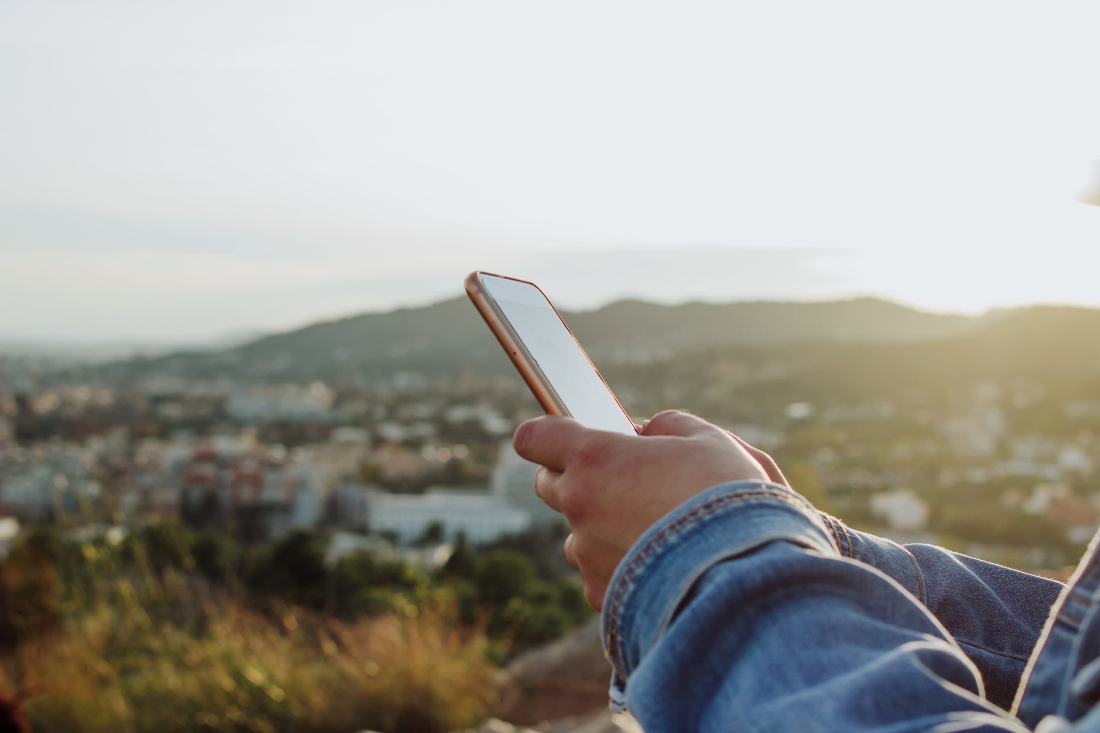 Close-up of a person holding a mobile phone