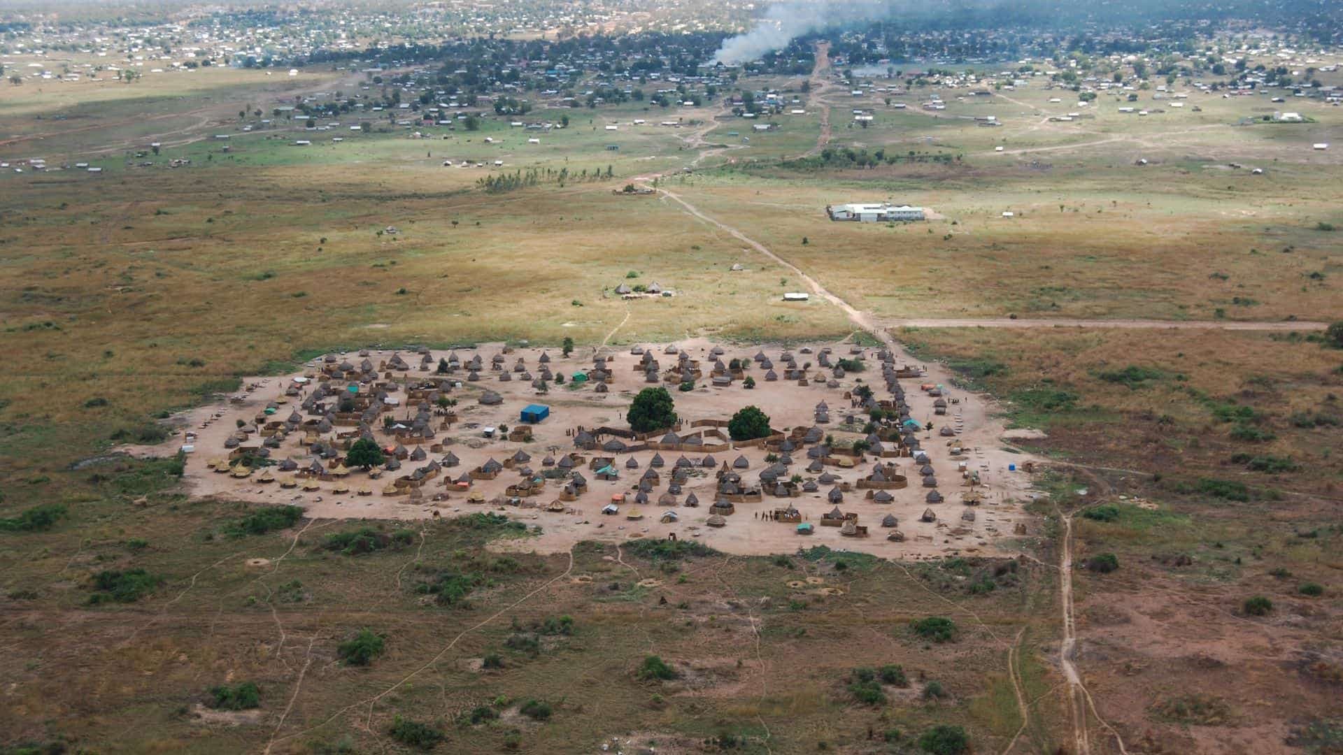 Aerial view of a rural village in a barren landscape